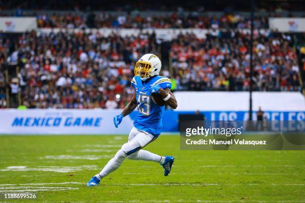 Wide receiver Keenan Allen of Los Angeles Chargers runs with the ball during the first half of a match against Kansas City Chiefs at Estadio Azteca...