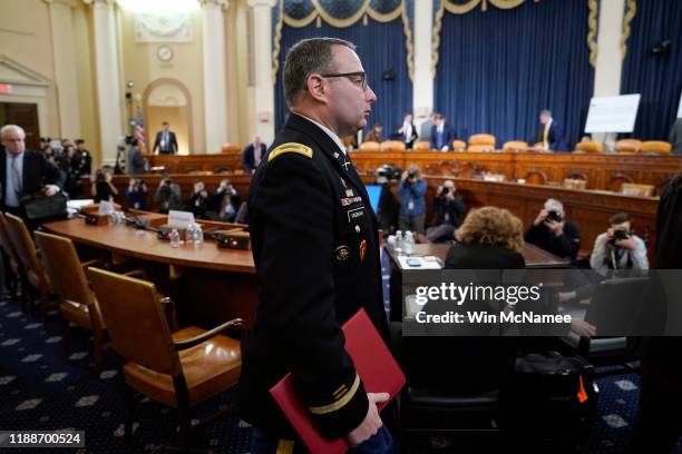 Lt. Col. Alexander Vindman, National Security Council Director for European Affairs, departs after testifying before the House Intelligence Committee...