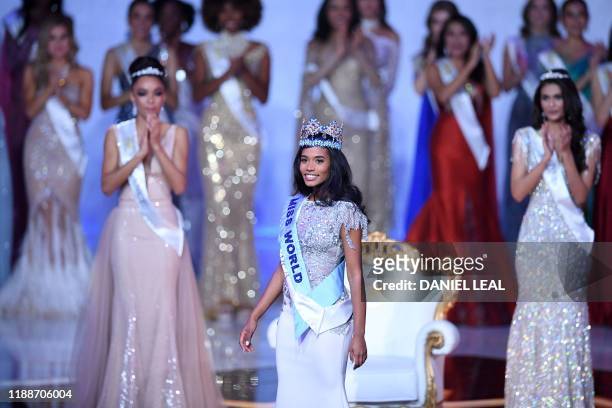 Newly crowned Miss World 2019 Miss Jamaica Toni-Ann Singh smiles during the Miss World Final 2019 at the Excel arena in east London on December 14,...
