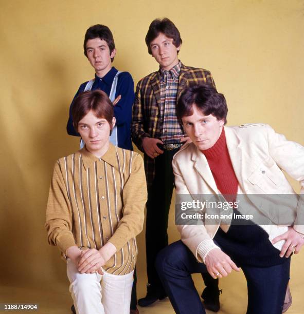 English musician, songwriter and producer Ronnie Lane , English drummer Kenney Jones, English musician and actor Jimmy Winston, and English musician,...