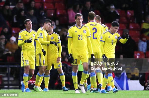 Baktiyor Zainutdinov of Kazakhstan celebrates with his team mates after scoring his team's first goal during the UEFA Euro 2020 qualifier between...