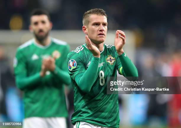 Steven Davis of Northern Ireland claps the fans after the UEFA Euro 2020 Qualifier between Germany and Northern Ireland at Commerzbank Arena on...