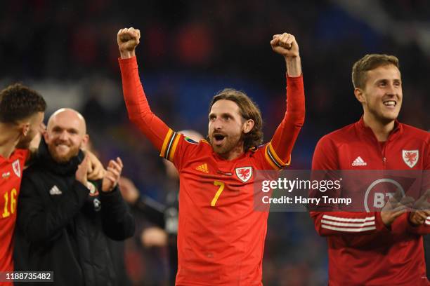 Joe Allen of Wales celebrates after the final whistle during the UEFA Euro 2020 qualifier between Wales and Hungary so at Cardiff City Stadium on...
