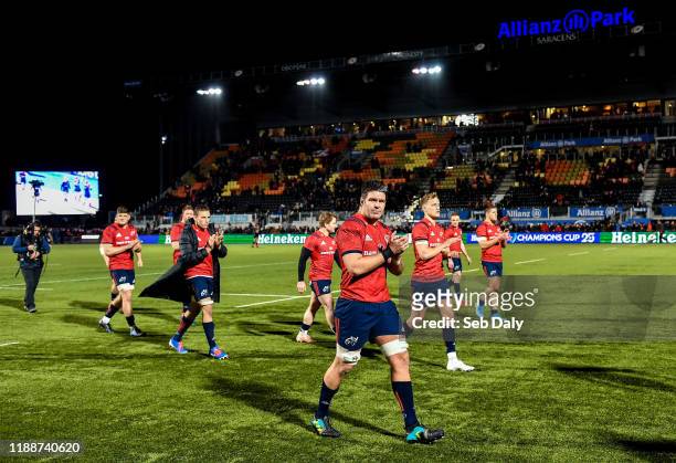 London , United Kingdom - 14 December 2019; Billy Holland of Munster, centre, with team-mates following their side's defeat during the Heineken...