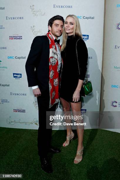 Joseph Bates and Jodie Kidd attend the 13th annual Emeralds & Ivy Ball in partnership with Cancer Research UK and The Marie Keating Foundation at Old...