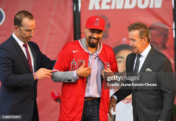 Los Angeles Angels owner Arte Moreno and general manager Billy Eppler look on as All-Star infielder Anthony Rendon is presented his jersey during a...