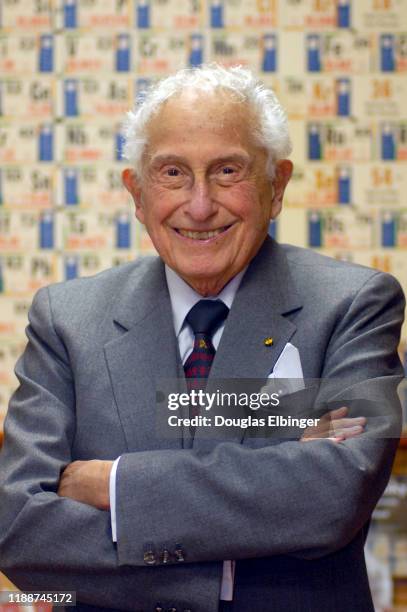 Portrait of American inventor, scientist, and engineer Stanford Robert Ovshinsky as he poses with his arms folded, Bloomfield Hills, Michigan,...