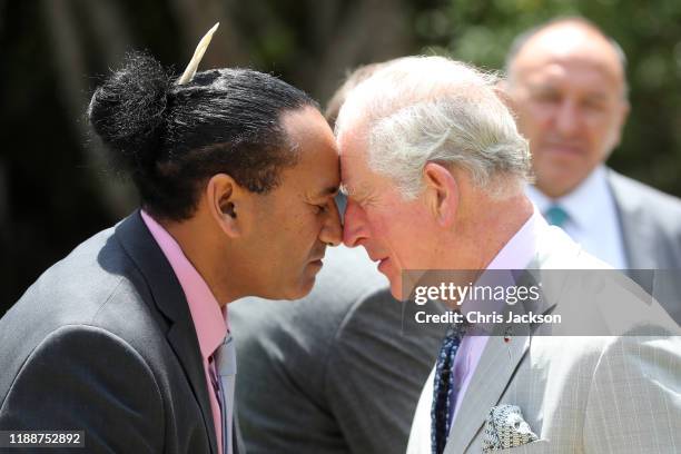 Prince Charles, Prince of Wales receives a Hongi, a traditional Maori greeting, during a visit to Waitangi Treaty Grounds on November 20, 2019 in...