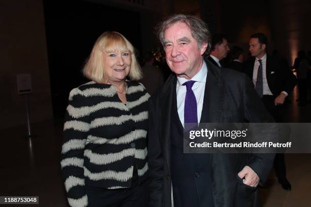 Jean-Michel Wilmotte and his wife Nicole Wilmotte attend the Grand Dinner of the Louvre on November 19, 2019 in Paris, France.