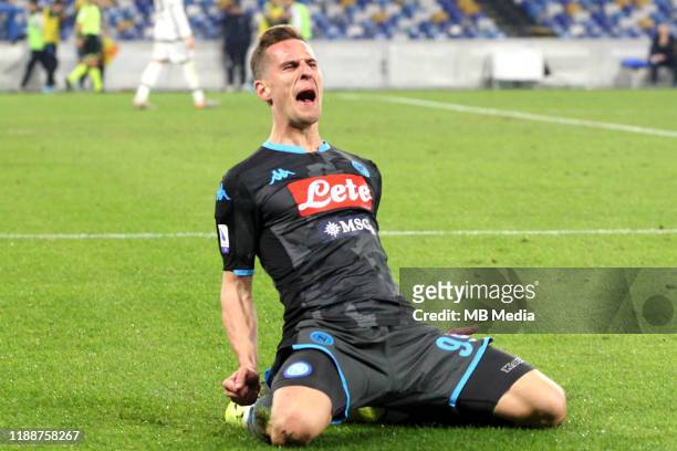 Arkadiusz Milik of SSC Napoli celebrates after his goal 1-1 during the Serie A match between SSC Napoli and Parma Calcio at Stadio San Paolo on...