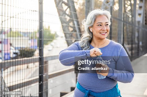 Senior Mexican Woman Drinking Water Senior Mexican Woman Drinking Water