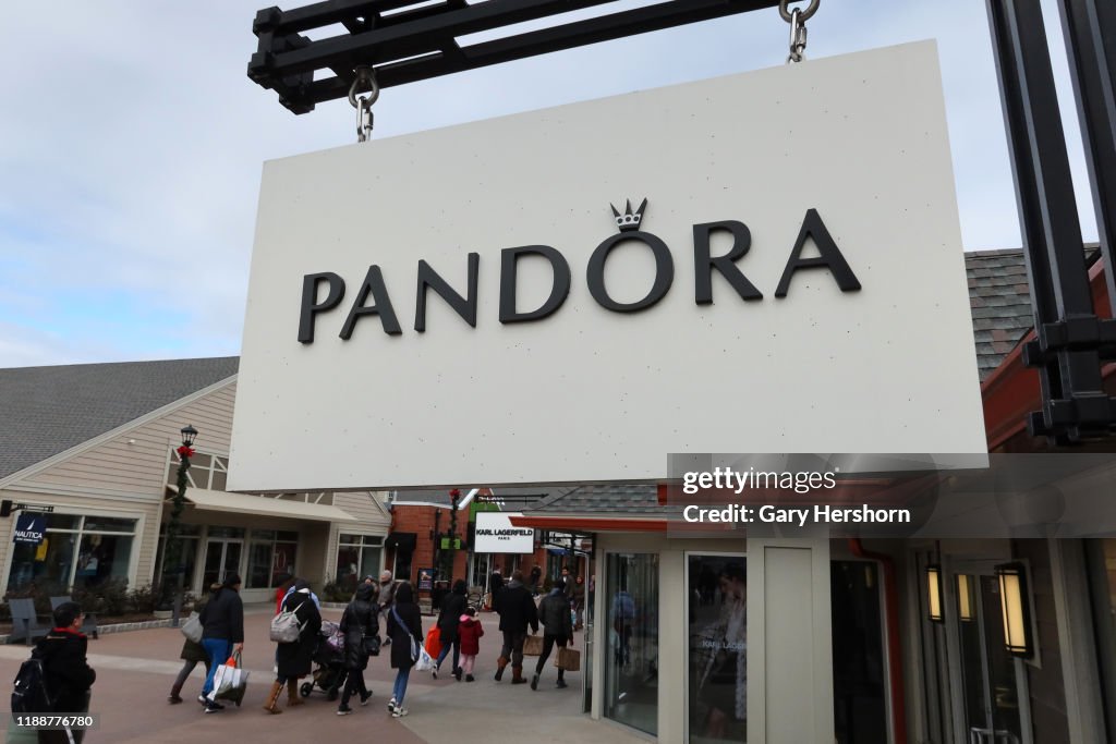 A Pandora sign hangs in front of their store at the Woodbury Common ...
