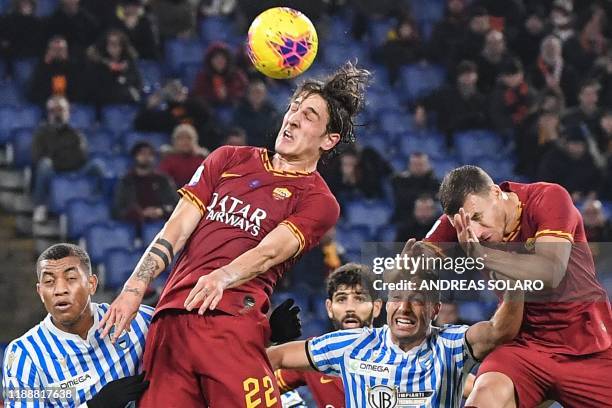 Roma's Italian midfielder Nicolo Zaniolo goes for a header during the Italian Serie A football match AS Roma vs Spal on December 15, 2019 at the...