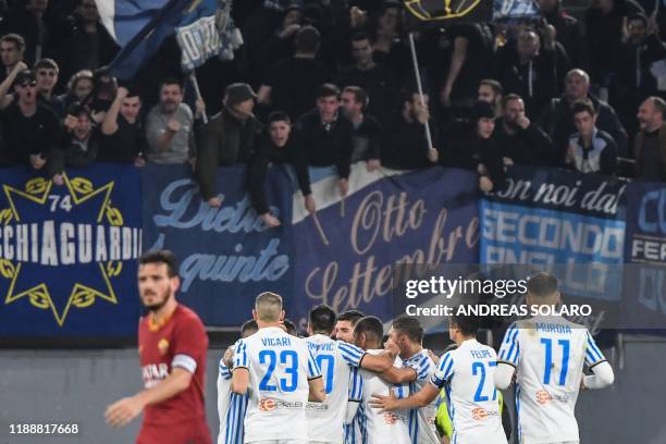 Spal players celebrate opening the scoring during the Italian Serie A football match AS Roma vs Spal on December 15, 2019 at the Olympic stadium in...