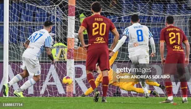 Spal's Italian forward Andrea Petagna opens the scoring during the Italian Serie A football match AS Roma vs Spal on December 15, 2019 at the Olympic...