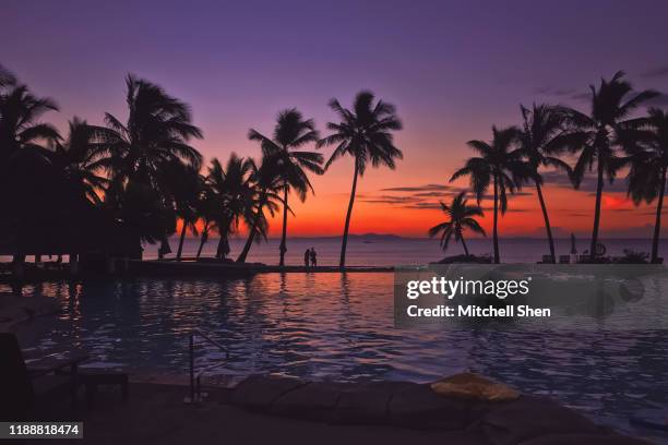 sunset in fiji - heavenly resort stock pictures, royalty-free photos & images