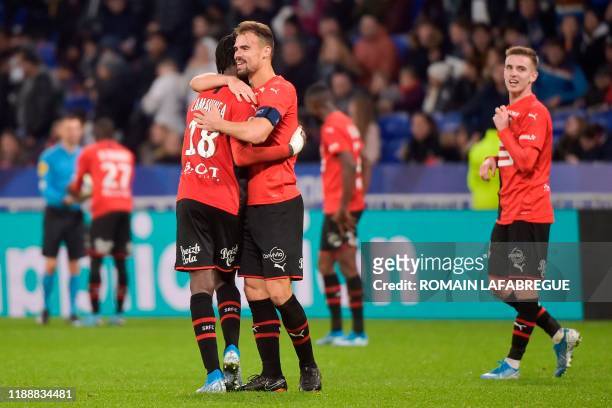 Rennes' French midfielder Eduardo Camavinga celebrates with Rennes' French defender Damien Da Silva after scoring a goal during the French L1...