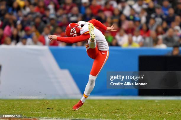 Harrison Butker of the Kansas City Chiefs kicks off to the Los Angeles Chargers during an NFL football game on Monday, November 18 in Mexico City....