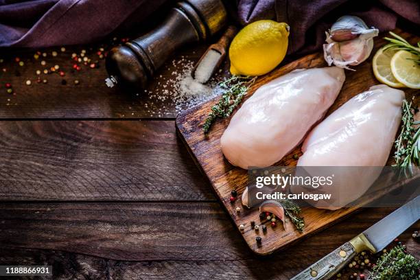 cooking chicken breast - raw chicken stock pictures, royalty-free photos & images