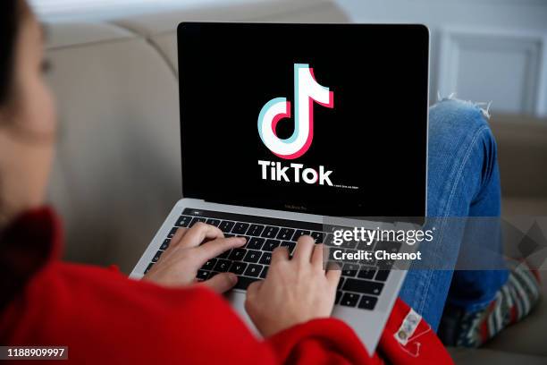 In this photo illustration the logo of Chinese media app for creating and sharing short videos TikTok, also known as Douyin is displayed on the...