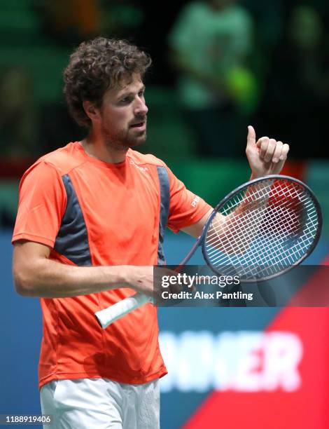 Robin Haase of the Netherlands applauds the fans after his Davis Cup Group Stage match against Daniel Evans of Great Britain during Day Three of the...