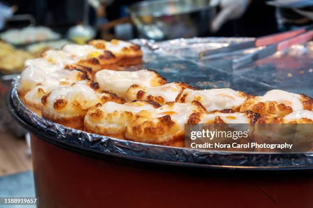 egg bread gyeran-ppang (gyeran-bbang)korean street food - braided bread stock pictures, royalty-free photos & images