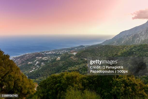 landscape with coastline at sunset, ikaria island, greece - ikaria island stock pictures, royalty-free photos & images