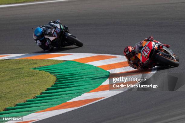 Marc Marquez of Spain and Repsol Honda Team leads Alex Marquez of Spain and LCR Honda during the MotoGP Tests in Valencia at Ricardo Tormo Circuit on...