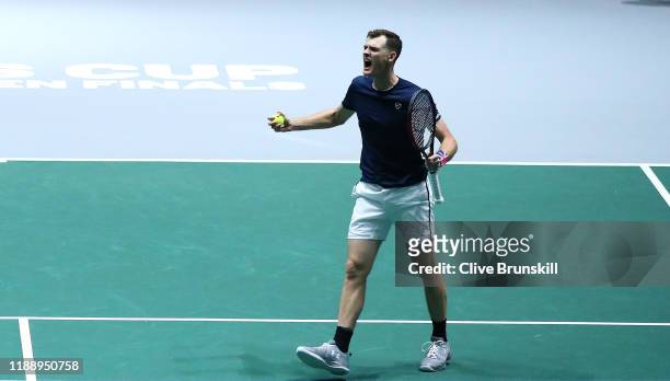 Jamie Murray of Great Britain, playing partner of Neal Skupski celebrates match point during their Davis Cup Group Stage match against Wesley Koolhof...