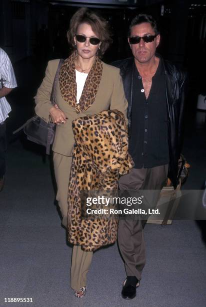 Actress Raquel Welch and boyfriend Richard Palmer depart for New York City on March 2, 1998 at the Los Angeles International Airport in Los Angeles,...
