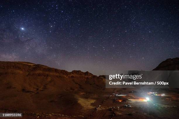 stars in sky at night above makhtesh ramon crater, negev desert, israel - meteor crater stock pictures, royalty-free photos & images