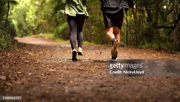 headed towards a healthier life - jogging track stock pictures, royalty-free photos & images