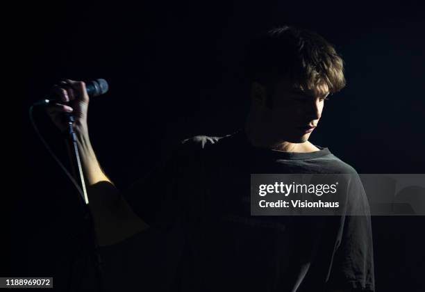 Fontaines DC Lead singer Grian Chatten performs with the band at the O2 Ritz on November 19, 2019 in Manchester, United Kingdom.