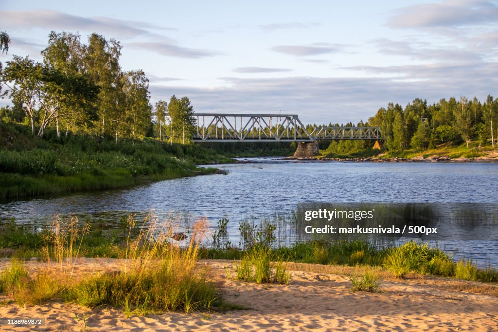View Of River And Bridge Above