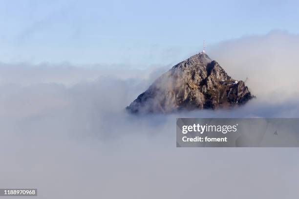 wendelstein peak hidden behind the clouds - wendelstein stock pictures, royalty-free photos & images