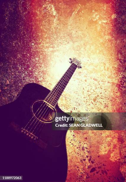 grunge acoustic guitar - rock n roll vintage stock pictures, royalty-free photos & images