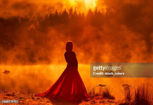 redhead woman posing at golden time - beautiful romanian women stock pictures, royalty-free photos & images