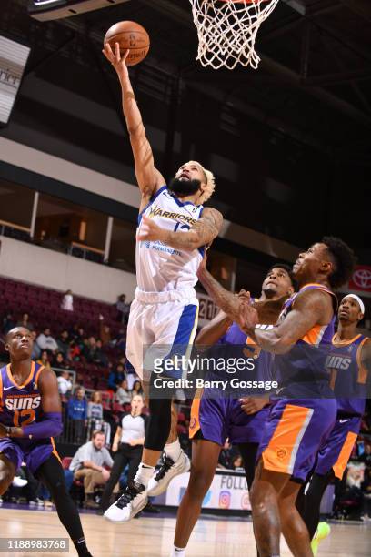 Ky Bowman of the Santa Cruz Warriors shoots against Daxter Miles Jr. #8 of the Northern Arizona Suns on December 15 at the Findlay Toyota Center in...