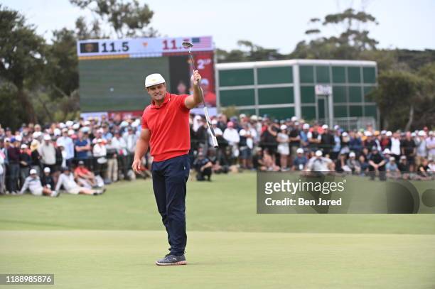 Team's Bryson DeChambeau reacts during the final round singles matches at the Presidents Cup at The Royal Melbourne Golf Club on December 15 in...