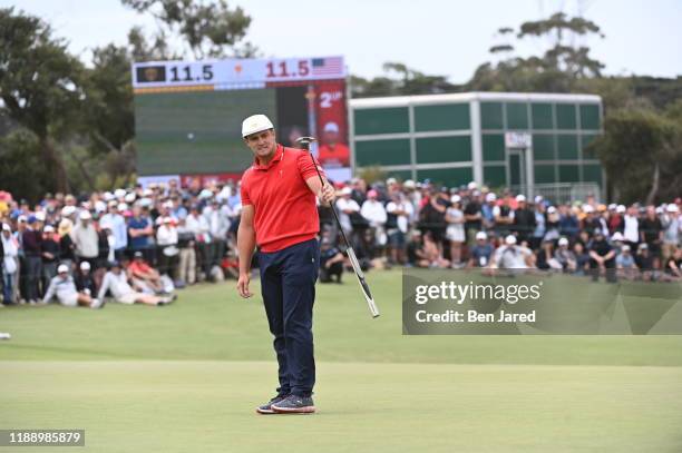 Team's Bryson DeChambeau reacts during the final round singles matches at the Presidents Cup at The Royal Melbourne Golf Club on December 15 in...