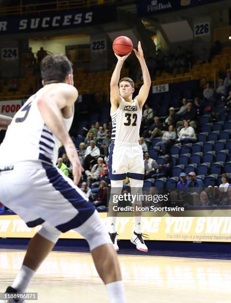 Chattanooga Mocs guard Matt Ryan shoots a three point basket during the college basketball game between Troy and UT-Chattanooga on December 15 at...