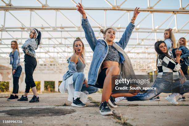 young female dancers - dance troupe stock pictures, royalty-free photos & images