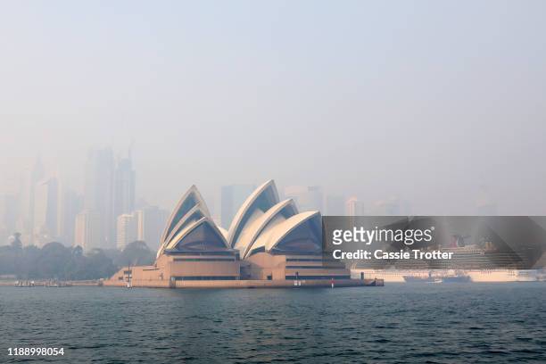 Smoke shrouds the Sydney Opera House on November 21, 2019 in Sydney, Australia. Most of NSW remains under severe or very high fire danger warnings as...