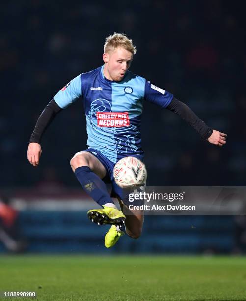 Jack Grimmer of Wycombe Wanderers controls the ball during the FA Cup First Round Replay between Wycombe Wanderers and Tranmere Rovers at Adams Park...