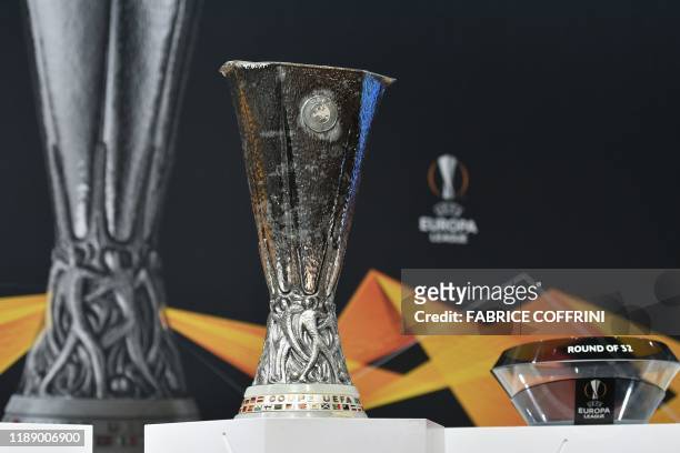 The UEFA Europa League football cup trophy is pictured before its round of 32 draw ceremony on December 16, 2019 in Nyon.