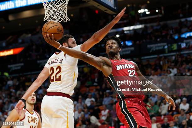 Jimmy Butler of the Miami Heat attempts a layup against Larry Nance Jr. #22 of the Cleveland Cavaliers during the second half at American Airlines...