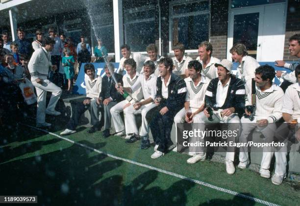 The New Zealand team celebrate their first Test win over England in England with a glass of champagne at the end of the 2nd Test match between...