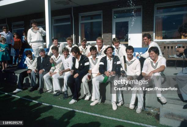 The New Zealand team celebrate their first Test win over England in England with a glass of champagne at the end of the 2nd Test match between...