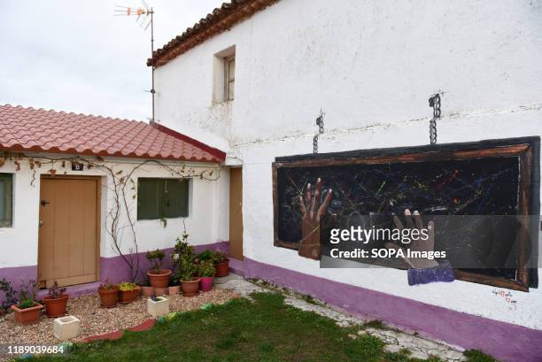 Graffiti painting on the wall in the village of Almarail, north of Spain. The neighbours of Almarail and Nomparedes, in Spanish province's Soria...