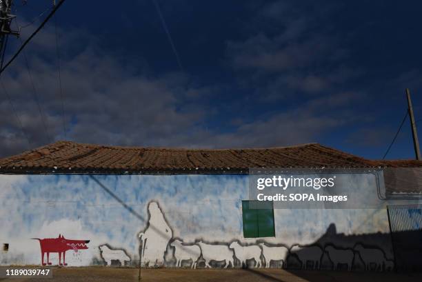 Graffiti painting on the wall in the village of Almarail, north of Spain. The neighbours of Almarail and Nomparedes, in Spanish province's Soria...